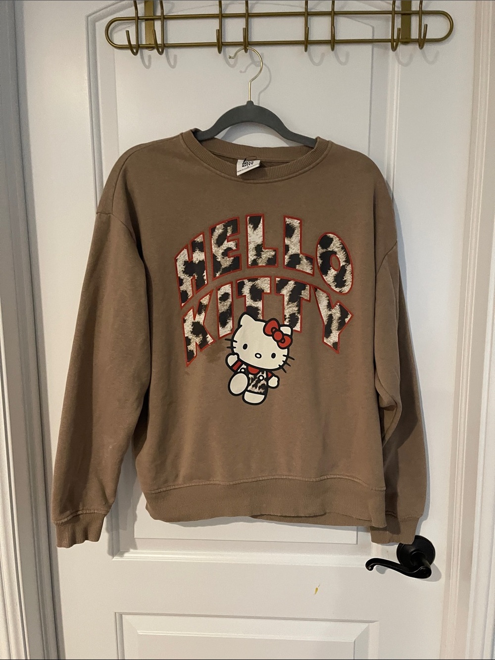 Hello Kitty Brown Crewneck with Leopard Logo Accents sweatshirt
